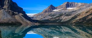 Preview wallpaper mountains, lake, reflection, snow, trees, landscape