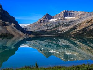 Preview wallpaper mountains, lake, reflection, snow, trees, landscape