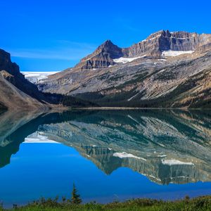 Preview wallpaper mountains, lake, reflection, snow, trees, landscape