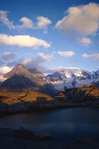 Preview wallpaper mountains, lake, ripples, shade, clouds, snow