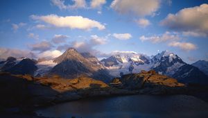 Preview wallpaper mountains, lake, ripples, shade, clouds, snow