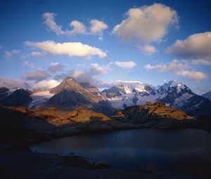 Preview wallpaper mountains, lake, ripples, shade, clouds, snow