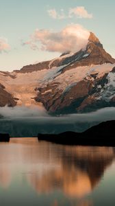 Preview wallpaper mountains, lake, rocks, snowy, clouds