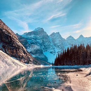 Preview wallpaper mountains, lake, rocks, ice, trees, slope