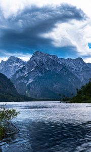 Preview wallpaper mountains, lake, rocks, snow, snowy, branches