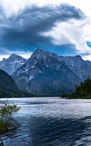 Preview wallpaper mountains, lake, rocks, snow, snowy, branches