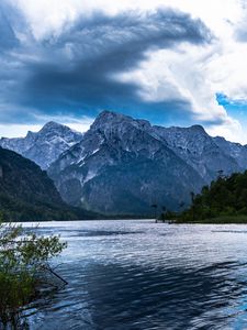 Preview wallpaper mountains, lake, rocks, snow, snowy, branches