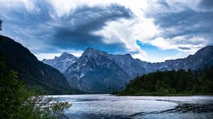 Preview wallpaper mountains, lake, rocks, snow, snowy, branches