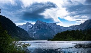 Preview wallpaper mountains, lake, rocks, snow, snowy, branches