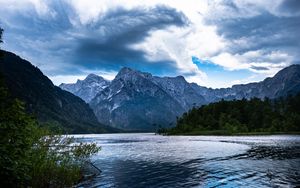 Preview wallpaper mountains, lake, rocks, snow, snowy, branches