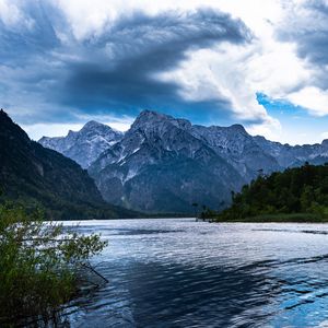 Preview wallpaper mountains, lake, rocks, snow, snowy, branches