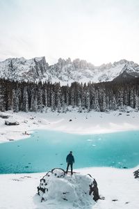 Preview wallpaper mountains, lake, snow, loneliness, solitude, man, winter