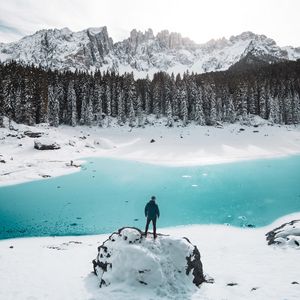 Preview wallpaper mountains, lake, snow, loneliness, solitude, man, winter