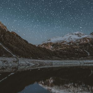 Preview wallpaper mountains, lake, starry sky, snowy, night