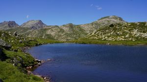 Preview wallpaper mountains, lake, stones, grass