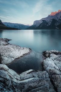 Preview wallpaper mountains, lake, stones, sky, landscape, wildlife