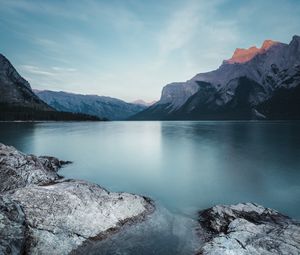 Preview wallpaper mountains, lake, stones, sky, landscape, wildlife