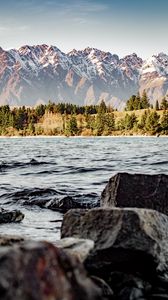 Preview wallpaper mountains, lake, stones, trees, snowy