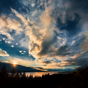 Preview wallpaper mountains, lake, sunset, horizon, clouds, trees, landscape