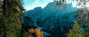 Preview wallpaper mountains, lake, trees, branches, sky, clouds