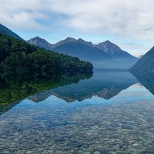 Preview wallpaper mountains, lake, trees, reflection, stones