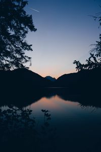 Preview wallpaper mountains, lake, twilight, reflection, horizon, branches