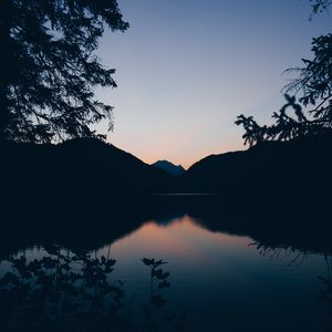 Preview wallpaper mountains, lake, twilight, reflection, horizon, branches