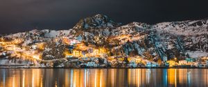 Preview wallpaper mountains, lake, village, night, light, snow