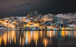 Preview wallpaper mountains, lake, village, night, light, snow