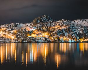 Preview wallpaper mountains, lake, village, night, light, snow