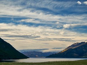 Preview wallpaper mountains, lake, water, grass, landscape, travel