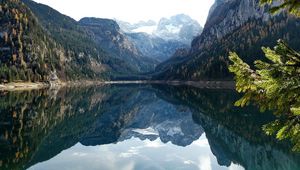 Preview wallpaper mountains, lake, water table, reflection, mirror, trees, branches