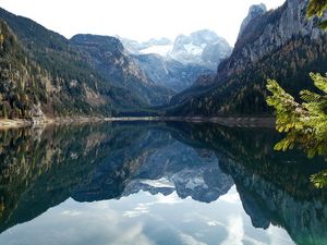 Preview wallpaper mountains, lake, water table, reflection, mirror, trees, branches