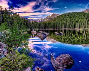 Preview wallpaper mountains, lake, wood, coast, reflection, mirror, clouds, brightly, sky, snag, stones, contrast