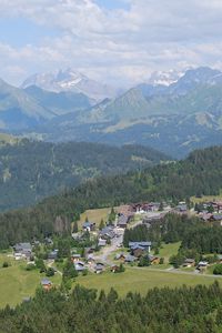 Preview wallpaper mountains, landscape, trees, nature, houses