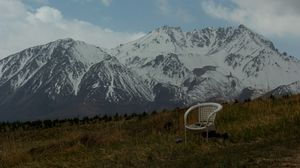 Preview wallpaper mountains, lawn, chair, grass, nature