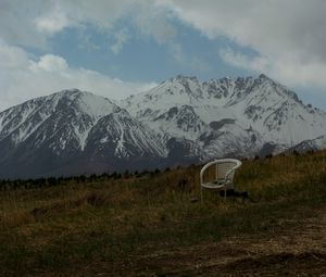 Preview wallpaper mountains, lawn, chair, grass, nature