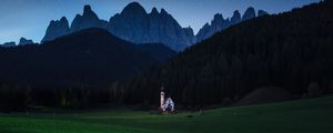 Preview wallpaper mountains, lawn, night, building, landscape