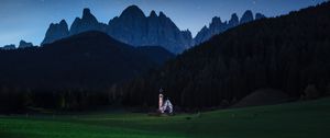 Preview wallpaper mountains, lawn, night, building, landscape