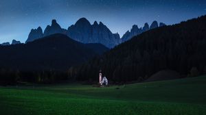 Preview wallpaper mountains, lawn, night, building, landscape