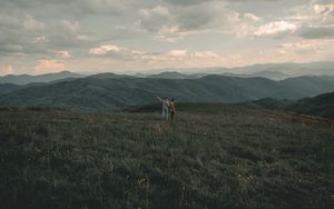 Preview wallpaper mountains, lawn, people, greenery, landscape