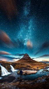 Preview wallpaper mountains, man, starry sky, waterfall, river