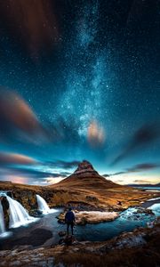 Preview wallpaper mountains, man, starry sky, waterfall, river