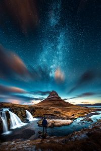 Preview wallpaper mountains, man, starry sky, waterfall, river