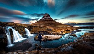 Preview wallpaper mountains, man, starry sky, waterfall, river