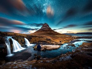 Preview wallpaper mountains, man, starry sky, waterfall, river