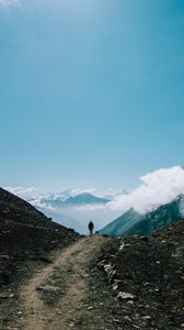 Preview wallpaper mountains, man, tourist, clouds