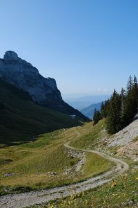 Preview wallpaper mountains, meadow, road, trees, landscape