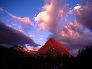 Preview wallpaper mountains, montana, clouds, sky, evening, national park