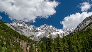 Preview wallpaper mountains, mountain range, peaks, trees, clouds